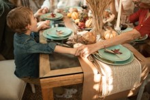 Photo: Thanksgiving Table Holding Holds with Family