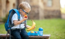 Photo: Child eating fruit